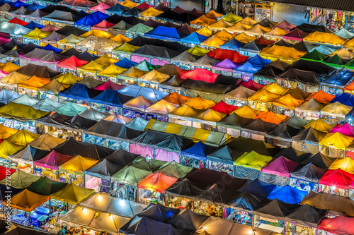 Cityscape at night of chatujak market secondhand market in Bangkok , Thailand photo