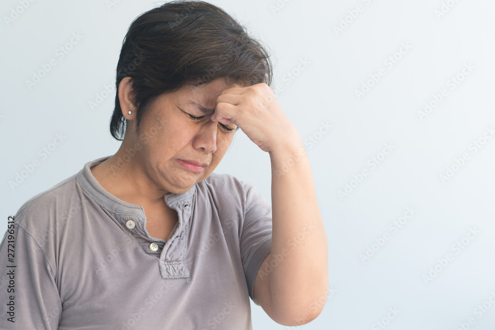 sick asian senior woman suffering from headache sick asian senior woman suffering from headache