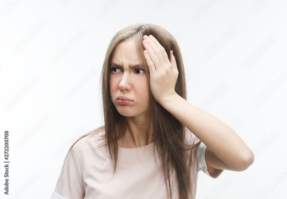 Young woman with head pain