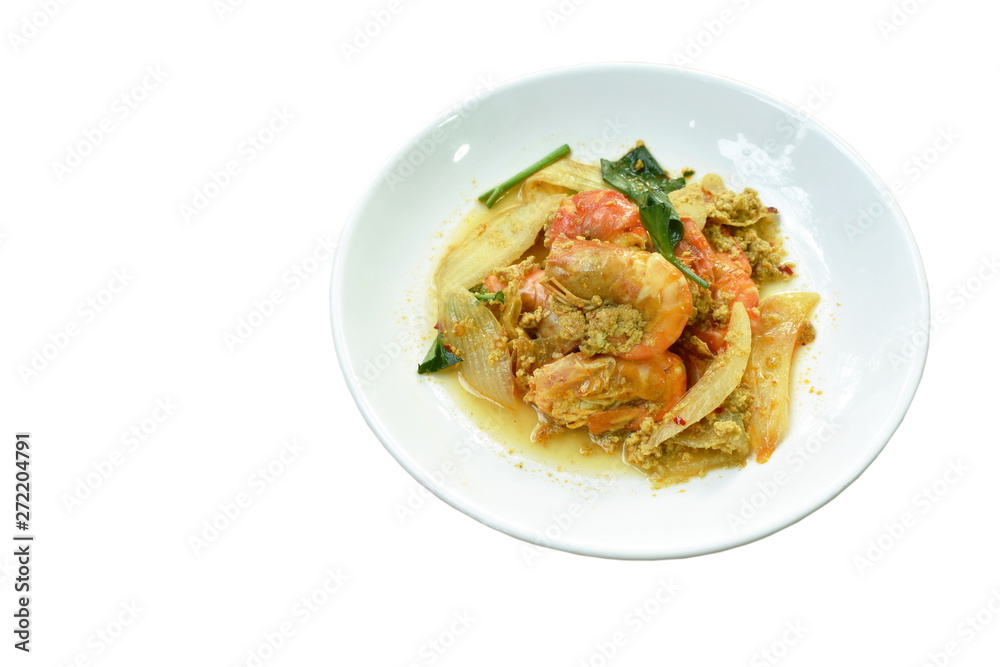 stir-fried shrimp with egg and yellow curry on dish stir-fried shrimp with egg and yellow curry on dish