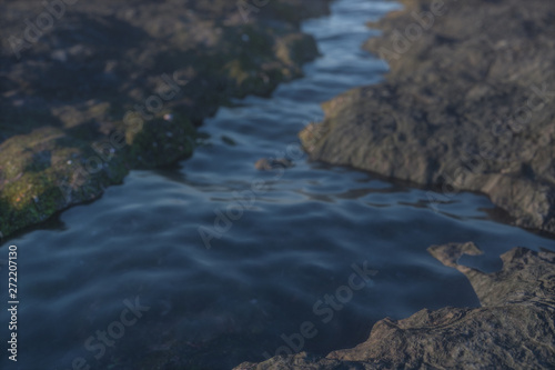 The river between the mountains in a sunny day, 3d rendering