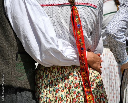 Folk dancer couple in traditional clothing photo