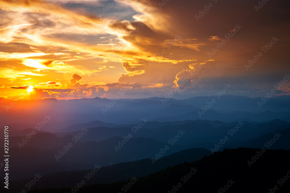 Majestic sunset sky over the mountains landscape