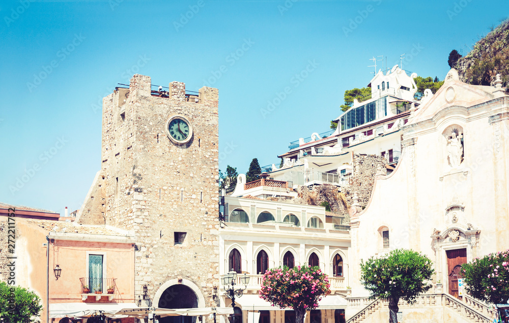 Beautiful cityscape of Italy, facade of old baroque buildings with Cathedral of Saint Giuseppe on the square of 9 April in Taormina, Sicily.