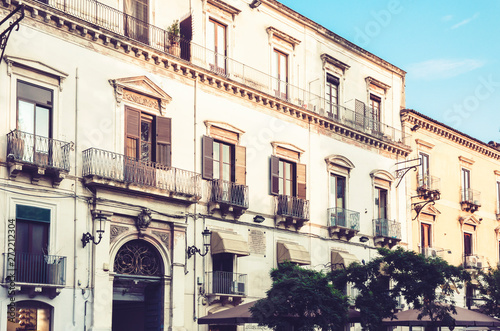 Italy, beautiful cityscape of Sicily, historical street of Catania, facade of old buildings .