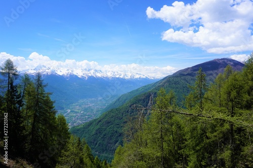 Beautiful mountainview with blue sky and great waether. Scenic view on Tirano. © Adrian