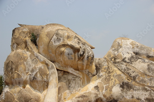 One Reclining Big Buddha.  Local Traditional Style Buddhis Temple In Thailand photo