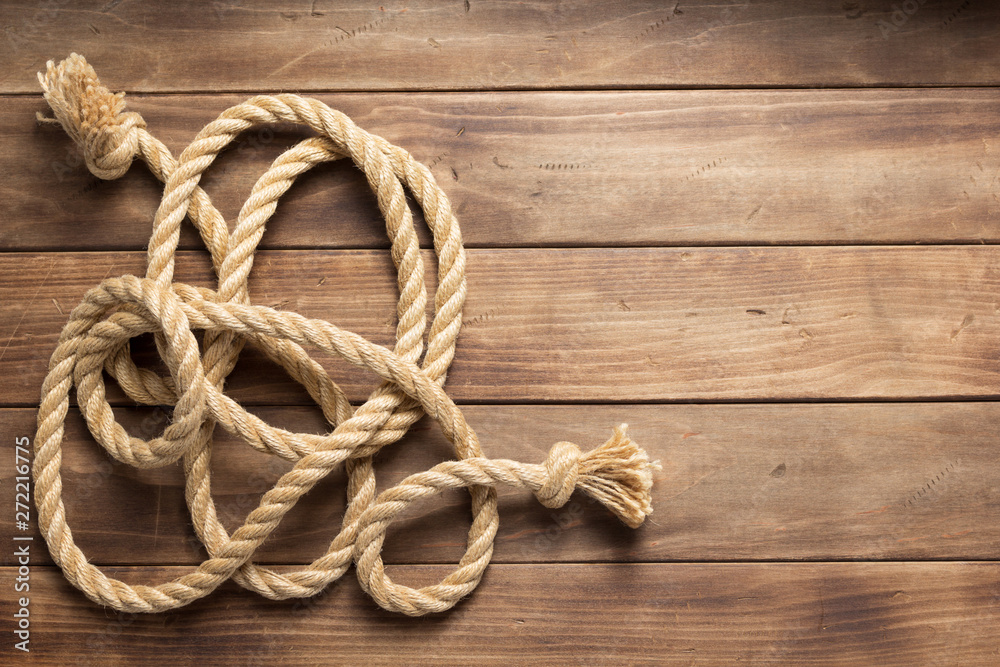 ship rope at wooden background texture ship rope at wooden background texture
