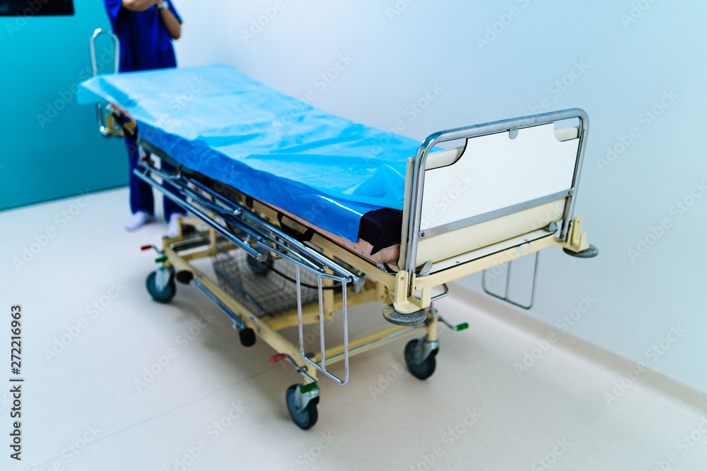 Empty hospital hallway with surgical transport equipment. Empty hospital hallway with surgical transport equipment.