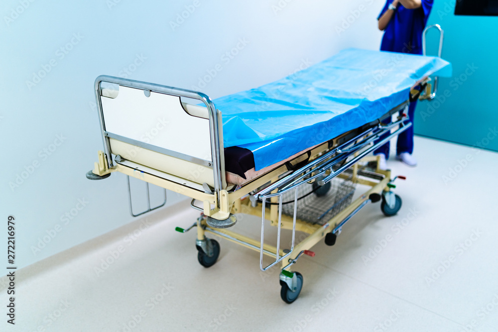 Empty hospital hallway with surgical transport equipment. Empty hospital hallway with surgical transport equipment.