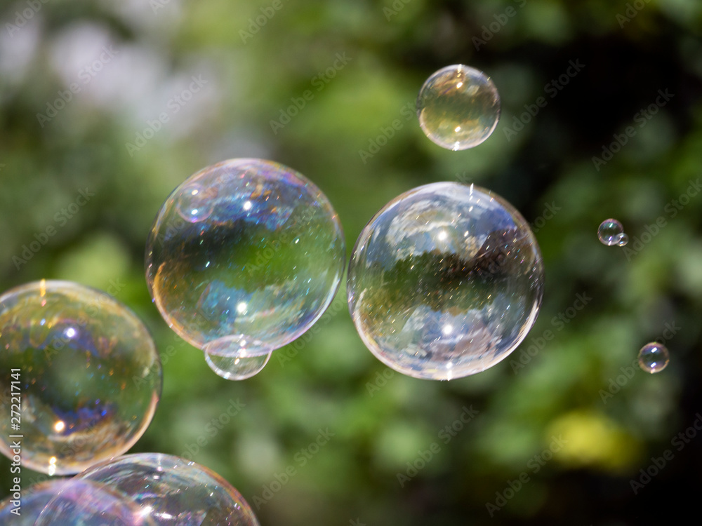 Abstract background with soap bubbles, close up, with reflection