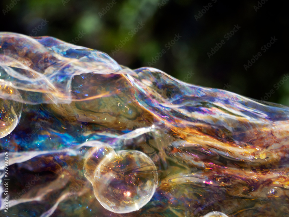 Naklejka premium Abstract background with soap bubbles, close up, with reflection