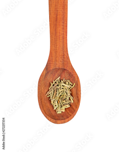 Dry rosemary in a spoon