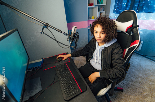 Obraz na plátně Shot of the Beautiful Pro Gamer Girl Playing in First-Person Shooter Online Video Game on Her Personal Computer