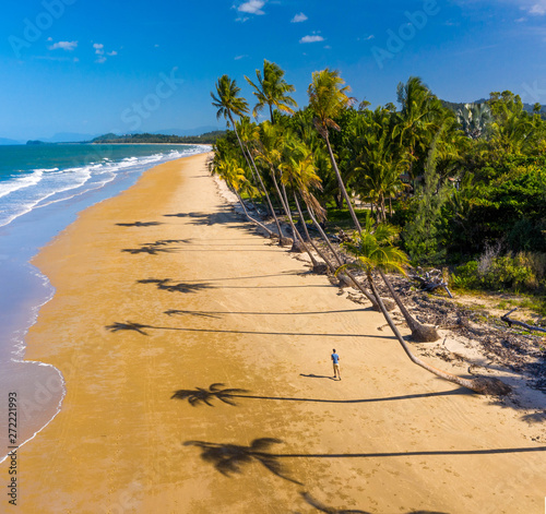 Fototapeta Naklejka Na Ścianę i Meble -  Aerial top view of beach with white sand, beautiful palm trees and warm turquoise tropical water