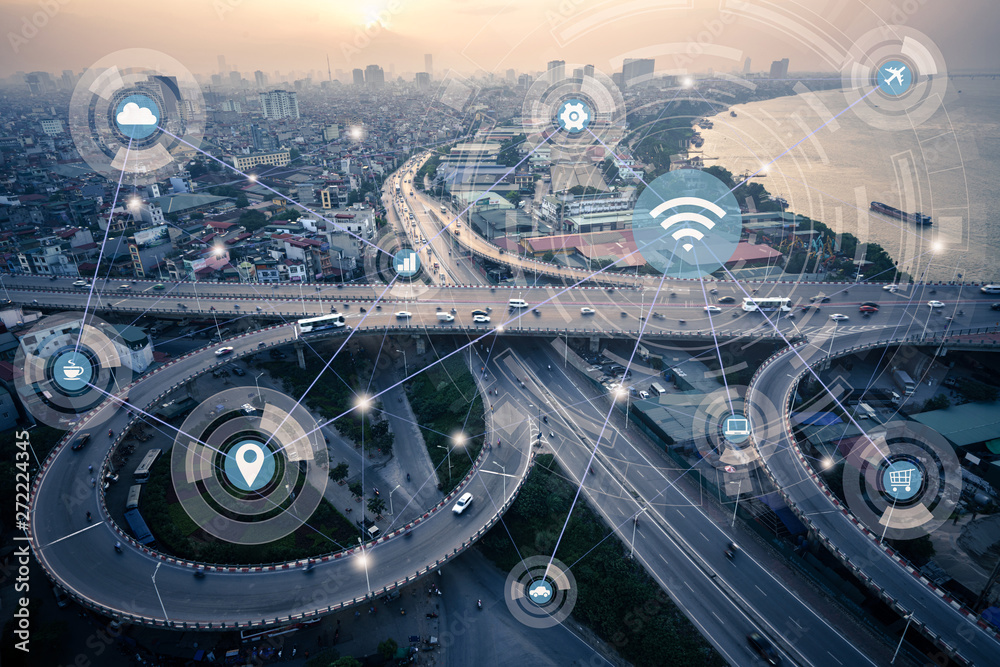 Fototapeta premium Smart city and wireless communication network concept. Digital network connection lines of Hanoi city at Vinh Tuy bridge