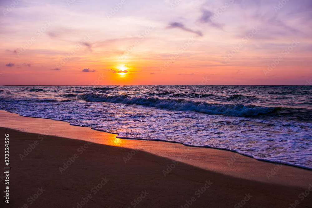 Silhouette of tropical beach during sunset twilight. Landscape of summer beach at sunset. Vacation background concept - Image