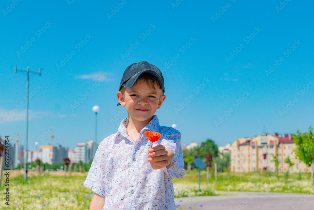 Fototapeta premium Little boy walking in the new Park