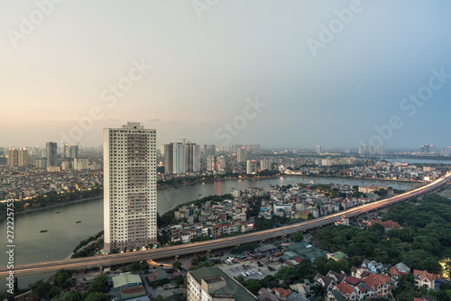 Aerial skyline view of Hanoi at Linh Dam lake  Belt Road No. 3. Hanoi cityscape by sunset period