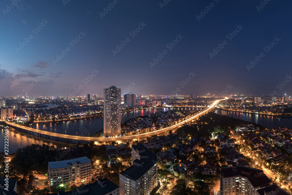 Aerial skyline view of Hanoi at Linh Dam lake, Belt Road No. 3. Hanoi cityscape by sunset period