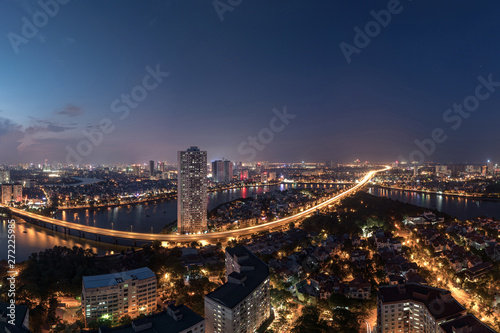 Aerial skyline view of Hanoi at Linh Dam lake, Belt Road No. 3. Hanoi cityscape by sunset period © Hanoi Photography