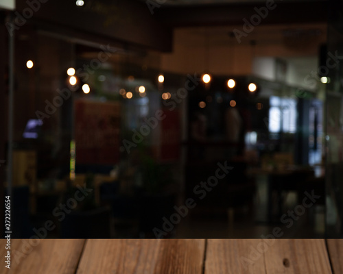 blurred cafe background with shiny light bulbs
