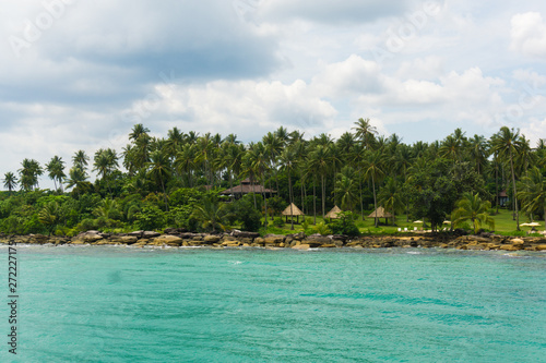 Beautiful sea beach with coconut tree © themorningglory