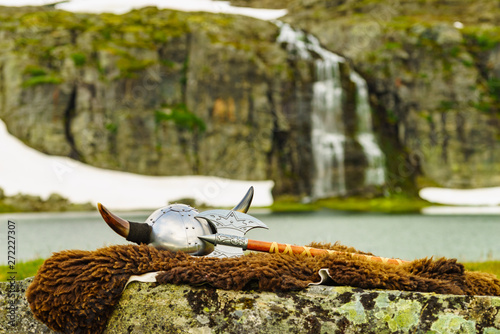 Viking helmet on lake shore, Norway photo