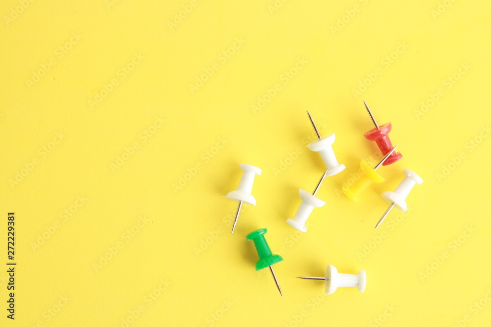 plastic thumbtacks in colorful background plastic thumbtacks in colorful background