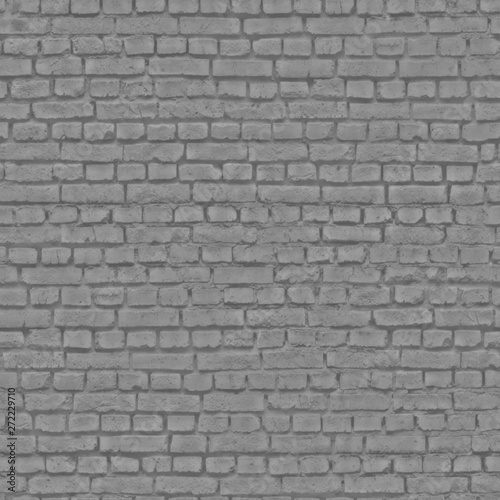 The wall of the abandoned building is made of dark gray bricks .Texture or background