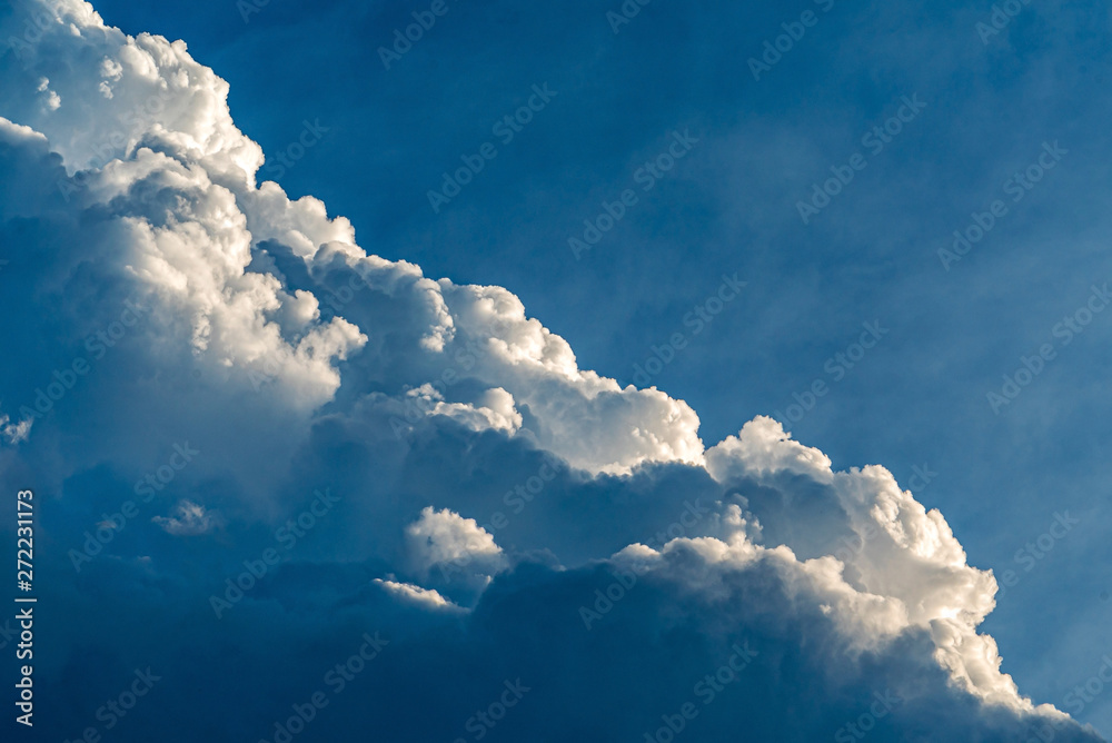 Blue sky with clouds and sun, sunset Blue sky with clouds and sun, sunset