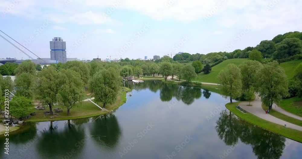 Aerial Forward: Waters of Munich Olympic Park Reflecting - Munich, Germany Aerial Forward: Waters of Munich Olympic Park Reflecting - Munich, Germany