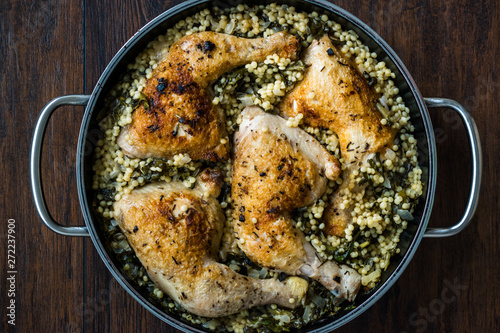 Couscous with Chicken Legs and Chard Roots in Pan Ready to Serve
