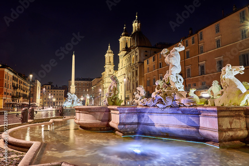 fountain in piazza navona by night, rome photo