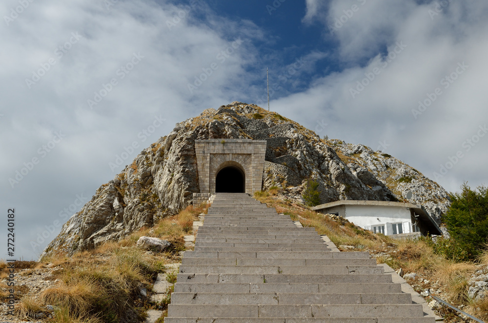 LOVCEN, MONTENEGRO: People at the stairs to the tunnel on the way to the Njegos mausoleum in Lovcen mountain and national park in southwestern Montenegro.