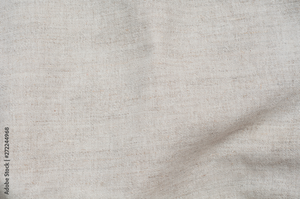 Fototapeta premium Gray beige fabric texture background. Tablecloth. Natural cotton