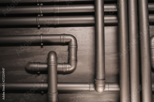 Copper pipe. Difficult communication, retro, texture a lot of pipes