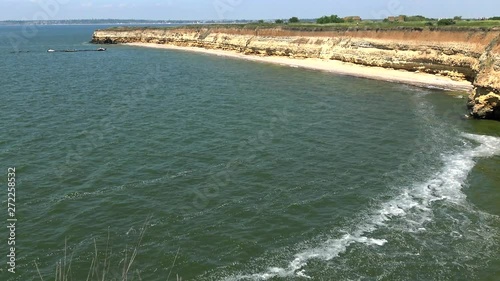 The steep coast of the island. Berezan (Borysthenes; Pirezin) is an island in the Black Sea at the entrance of the Dnieper-Bug Estuary, Ochakiv Raion, Mykolaiv Oblast, Ukraine. photo