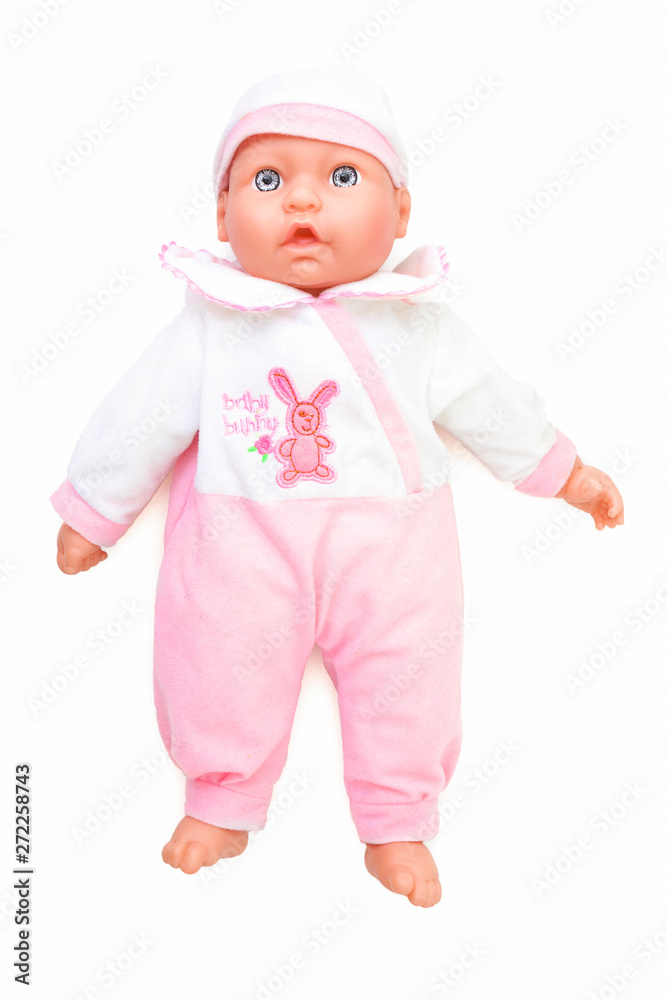 Tiny tots doll lying on white underlay, isolated on white background. Caucasian newborn baby doll. Dolly with cap. Baby puppet isolated on backdrop. Baby doll, pink clothes. Baby-doll clothed on white Tiny tots doll lying on white underlay, isolated on white background. Caucasian newborn baby doll. Dolly with cap. Baby puppet isolated on backdrop. Baby doll, pink clothes. Baby-doll clothed on white