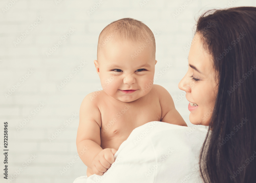 Portrait of angelic baby and his mother Portrait of angelic baby and his mother
