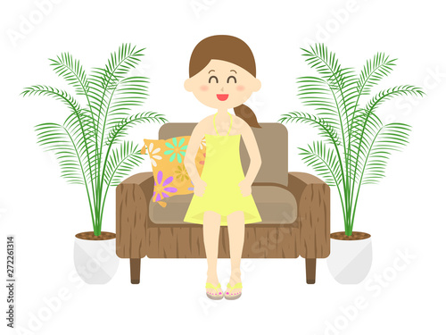 リゾートソファに座る女性のイラスト