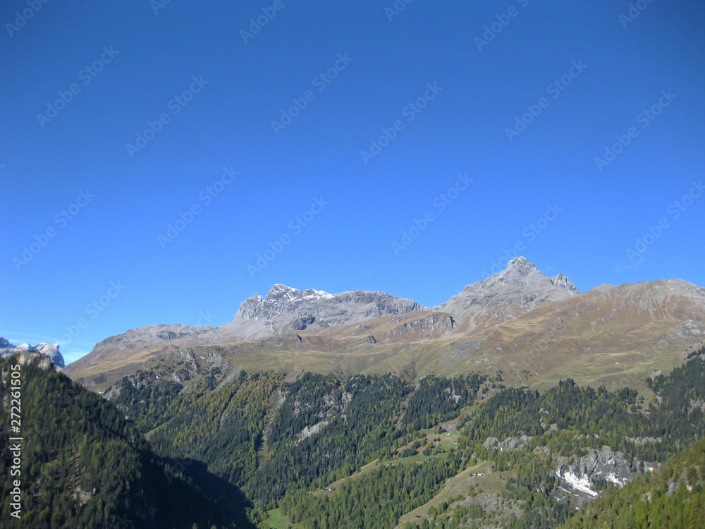 Coloured mountains in the swiss alps on a sunny day in autumn