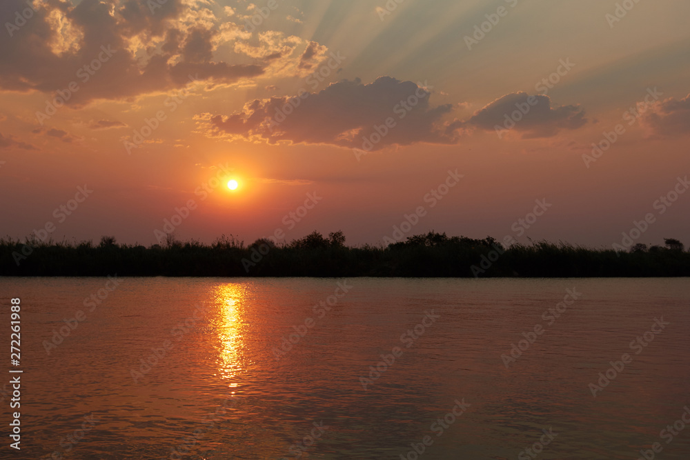 Sunset at the Okavango River in Namibia Sunset at the Okavango River in Namibia