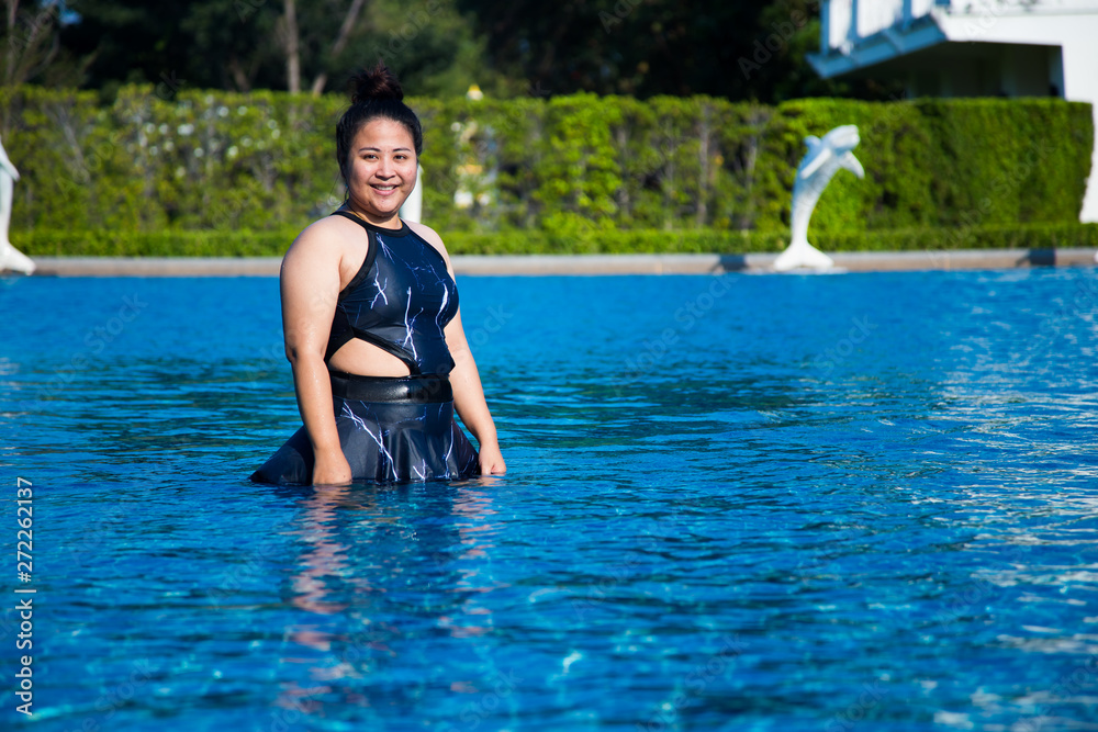 fat women on swimming pool