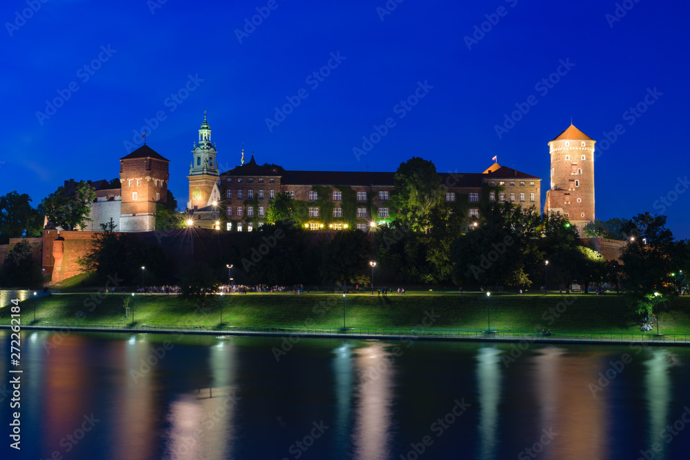 Wawel royal castle view from across the river Vistula (Wisla) at sunset