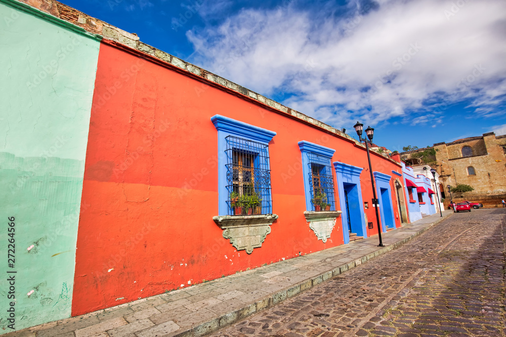 Oaxaca, Mexico-1 December, 2018: Scenic old city streets and colorful colonial buildings in historic city center Oaxaca, Mexico-1 December, 2018: Scenic old city streets and colorful colonial buildings in historic city center