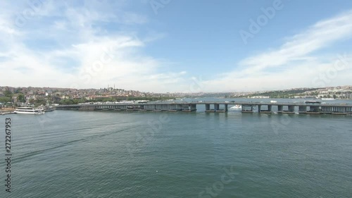 Wallpaper Mural The girl tourist with backpack standing on the bridge and enjoy the view. Bosphorus,Golden Horn Torontodigital.ca