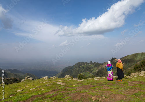 Two gurage tribe women on a hill looking the valley, Gurage zone, Butajira, Ethiopia photo
