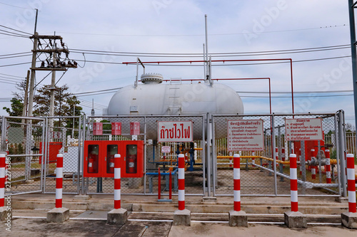 Prachinburi ,Thailand,7 Nov 2018, Take Photo tha LPG Tankyard with 2 cylender LPG tanks within safety boundary photo