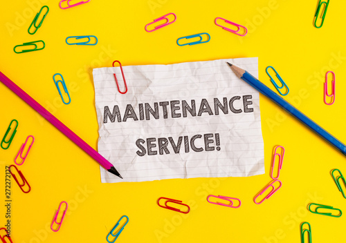 Conceptual hand writing showing Maintenance Service. Concept meaning Keep a Product Service in Good Operating Condition Blank crushed paper sheet message pencils colored background photo